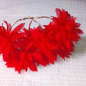 Beautiful feathery flowered red medium hoop earrings.
